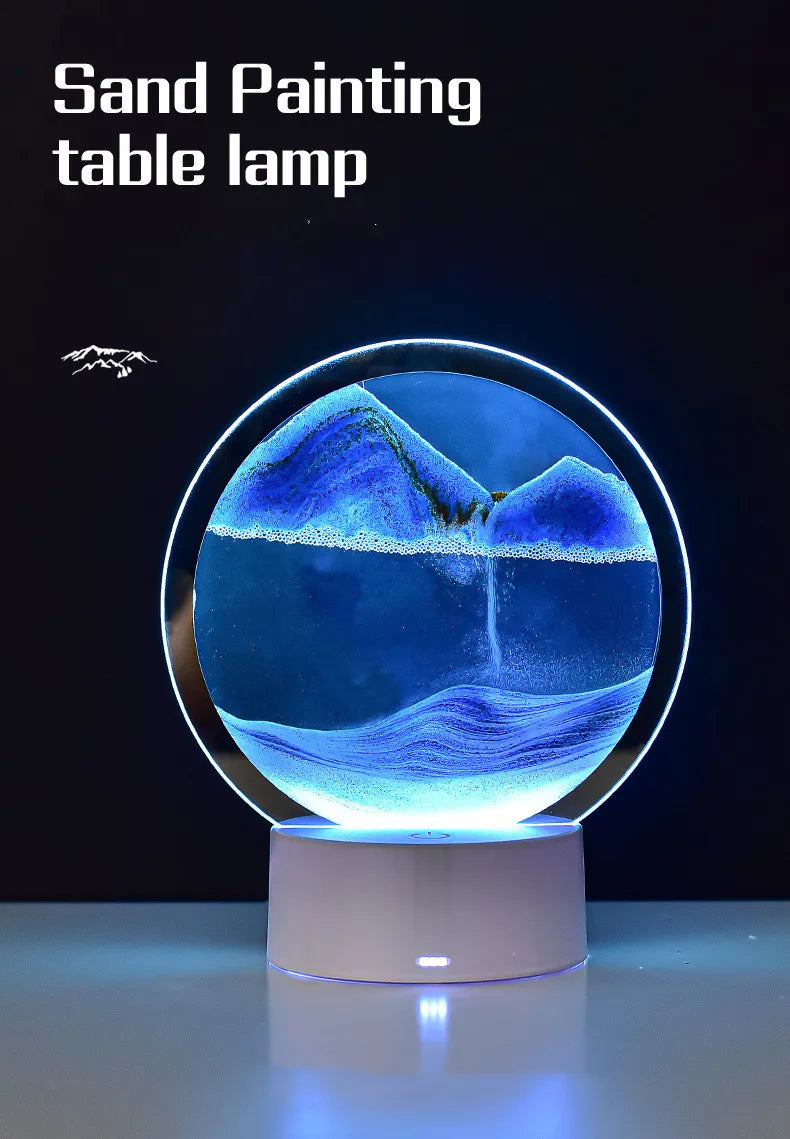 Sand painting table lamp with mountain design on a black background