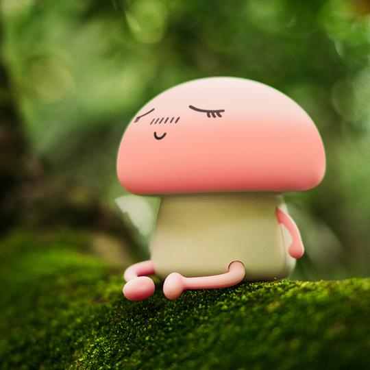Cute cartoon-style mushroom figurine with a smiling face on a green background