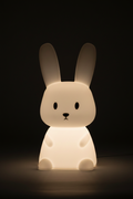 White rabbit-shaped night light on a white background